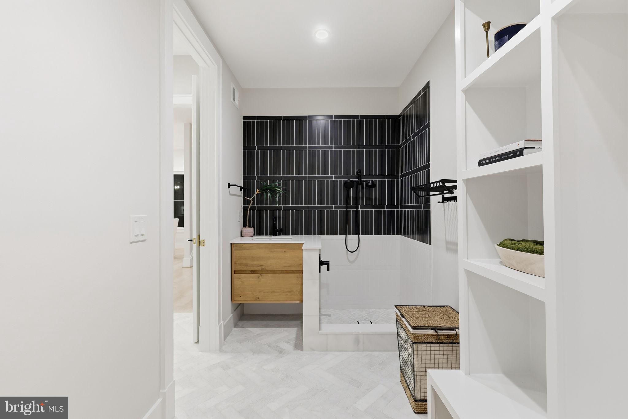 7000 Hector Road McLean, VA 22101 - Photo 46 of 50 a bathroom with a bathtub and shower