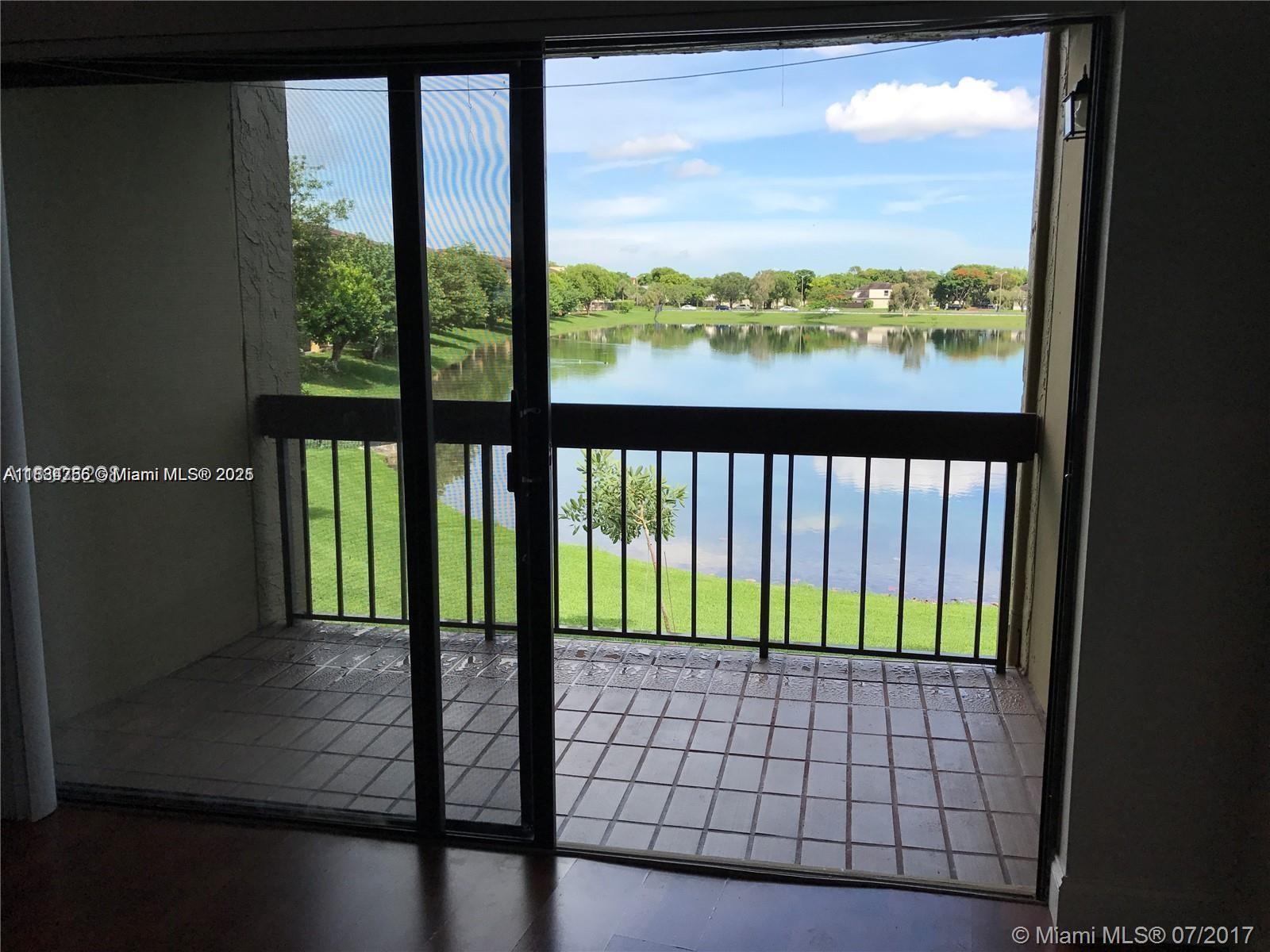 10288 Northwest 9th St Circle, Unit 205 Miami, FL 33172 - Photo 2 of 11 a view of balcony
