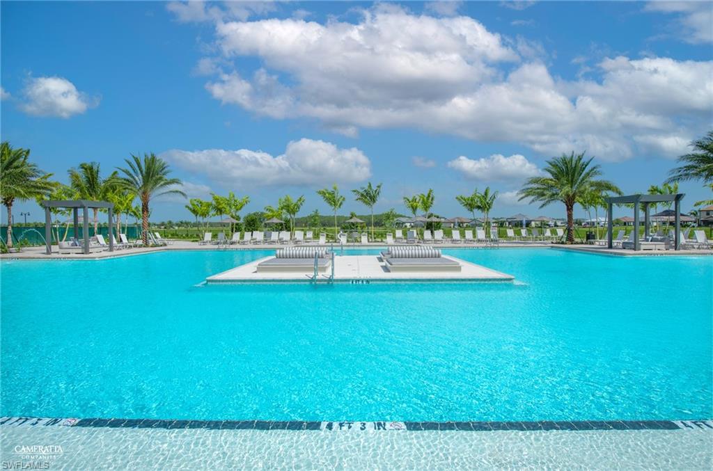 20619 Napa Loop Estero, FL 33928 - Photo 24 of 37 a view of swimming pool with outdoor seating and green space