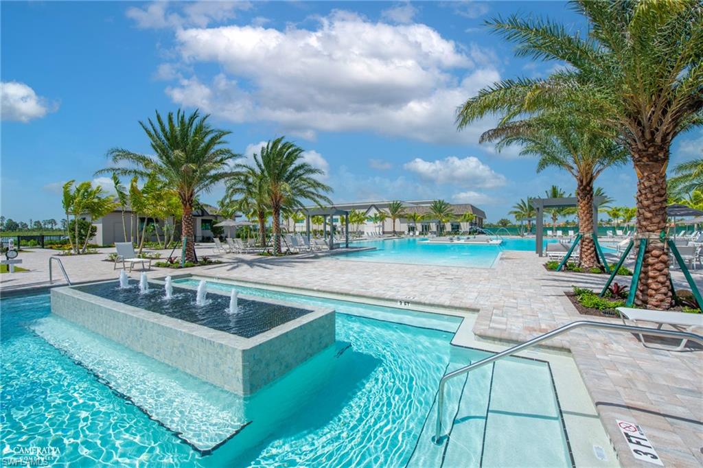 20619 Napa Loop Estero, FL 33928 - Photo 26 of 37 a view of a swimming pool and a terrace