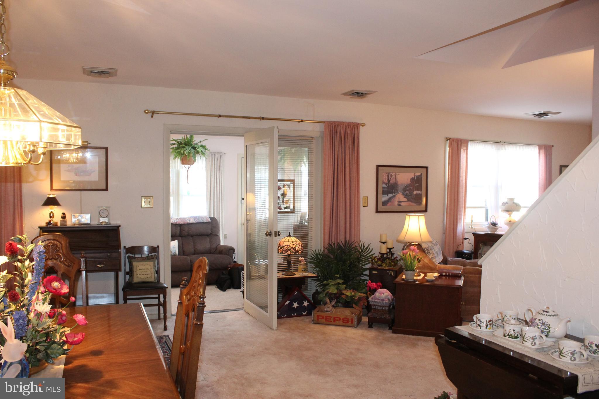 8 Branstock Court Lititz, PA 17543 - Photo 11 of 30 Dining area looking into sun room