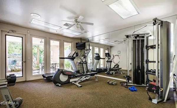 a view of a swimming pool with a patio