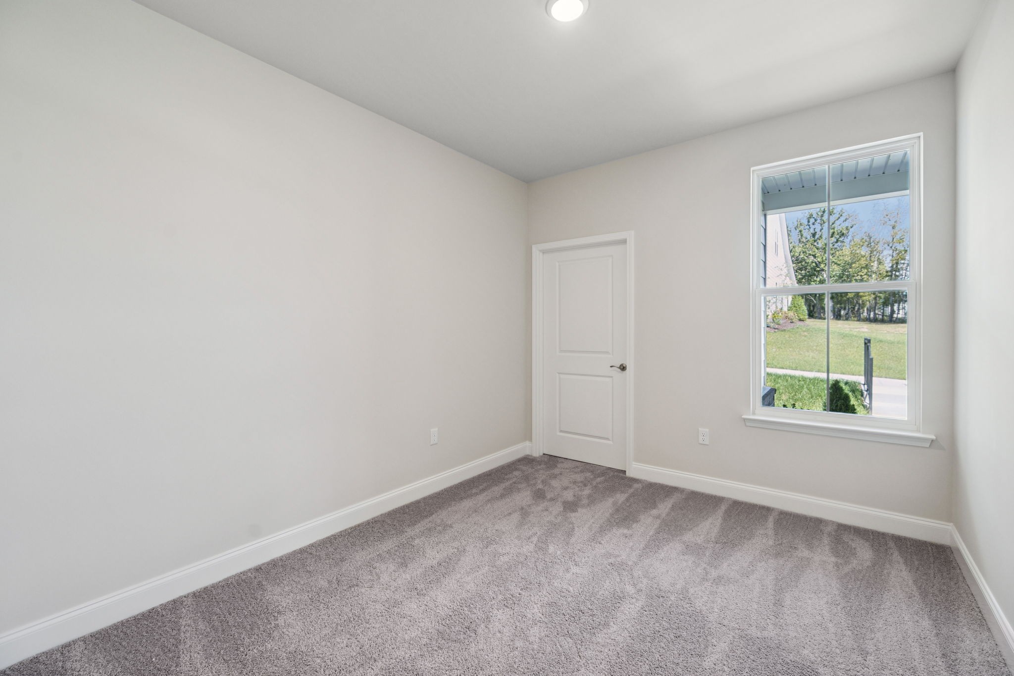 8152 Rocky Fork Almaville Road Smyrna, TN 37167 - Photo 16 of 43 an empty room with windows