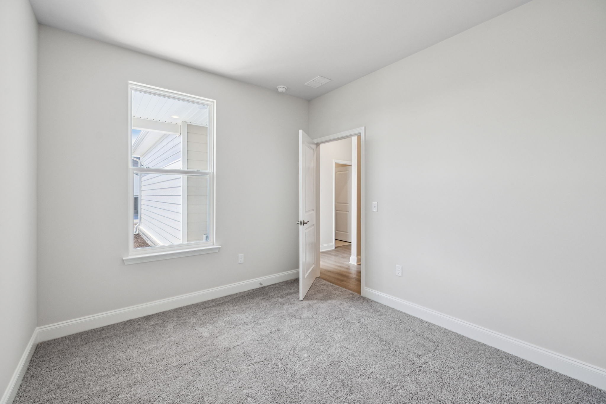 8152 Rocky Fork Almaville Road Smyrna, TN 37167 - Photo 30 of 43 an empty room with windows and closet