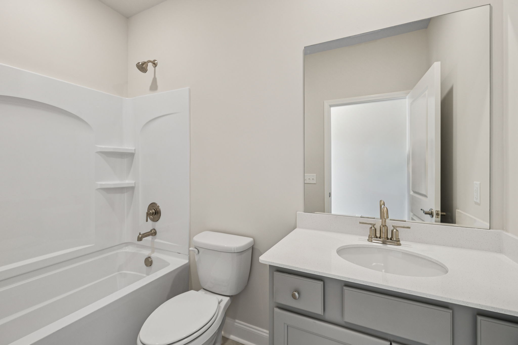 8152 Rocky Fork Almaville Road Smyrna, TN 37167 - Photo 31 of 43 a bathroom with a sink toilet vanity and bathtub