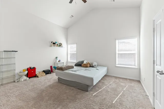 a bathroom with a tub and shower