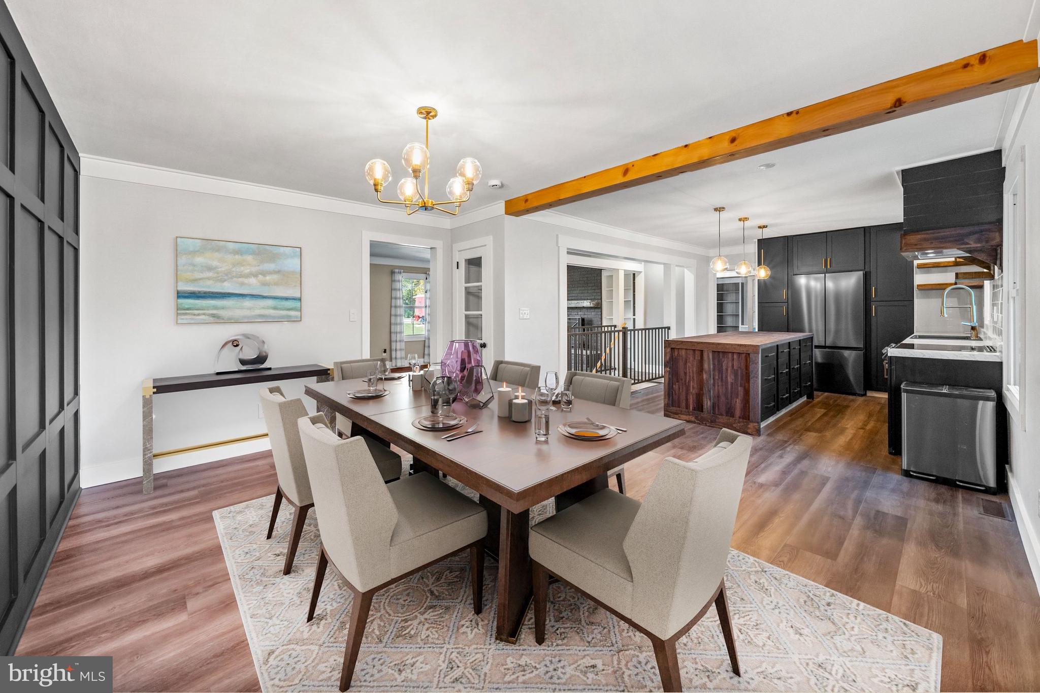 108 Evanson Road Hockessin, DE 19707 - Photo 18 of 49 a view of a dining room with furniture and wooden floor