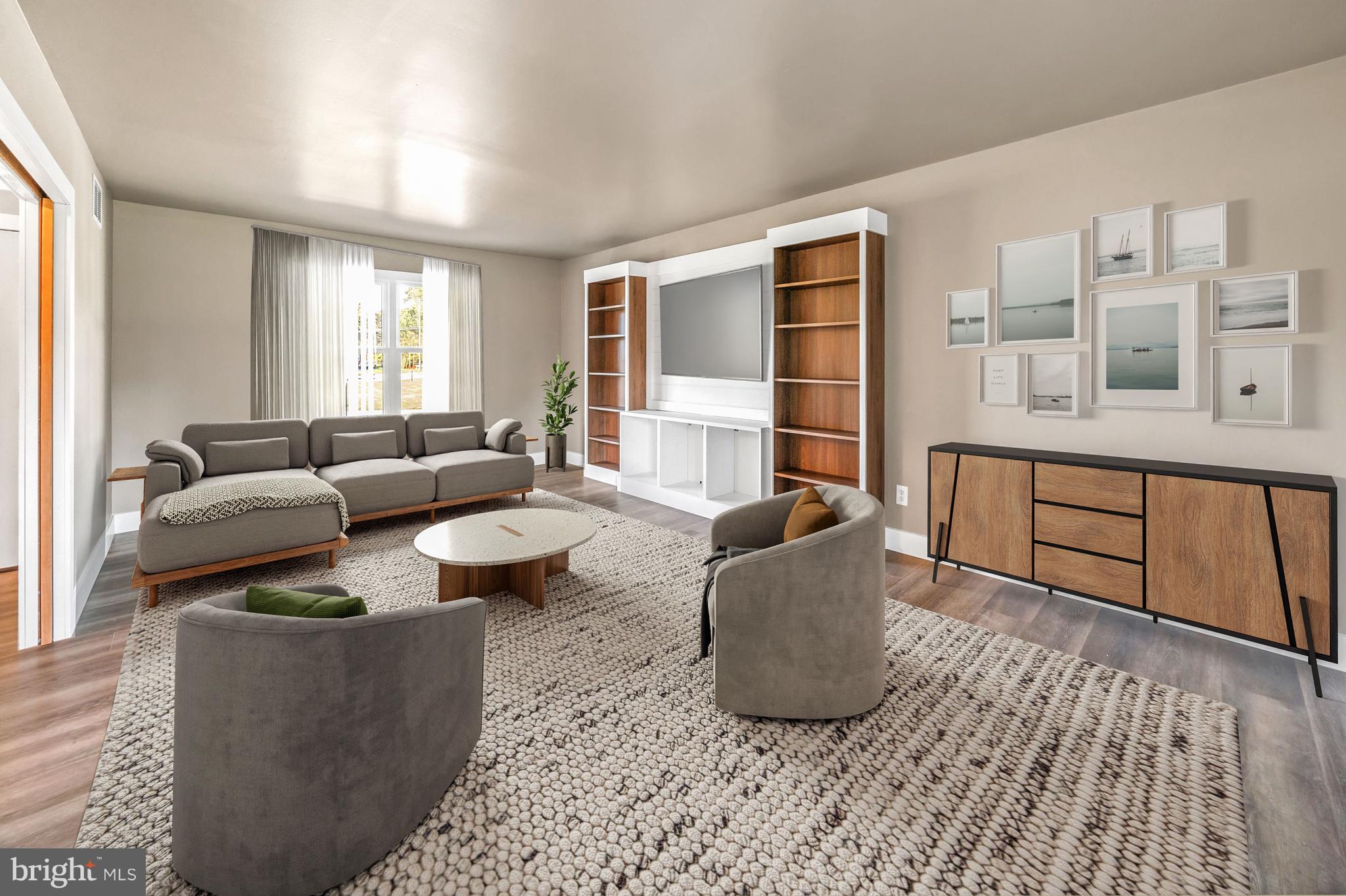 108 Evanson Road Hockessin, DE 19707 - Photo 27 of 49 a living room with furniture and a large window