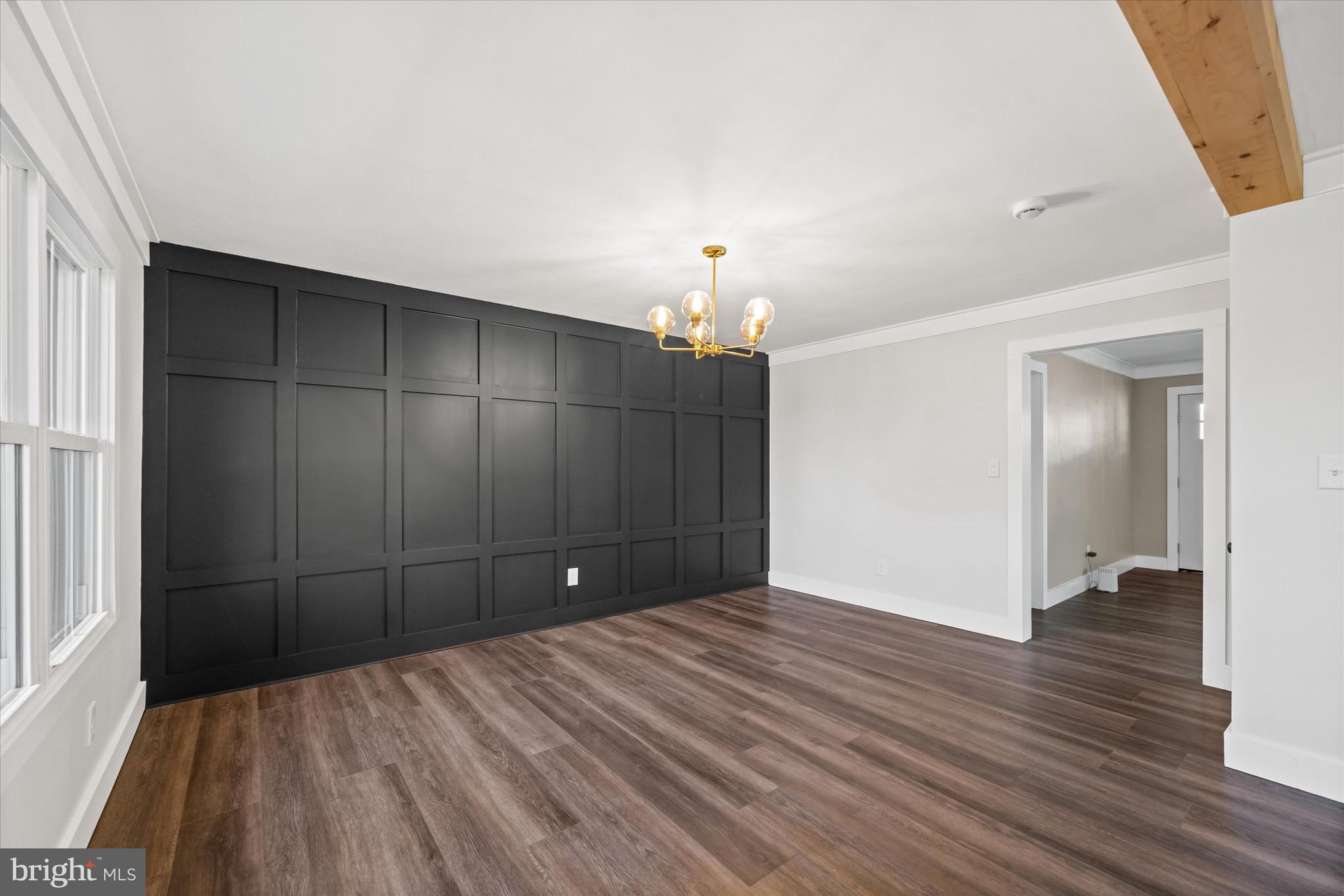 108 Evanson Road Hockessin, DE 19707 - Photo 29 of 49 wooden floor in an empty room with a window