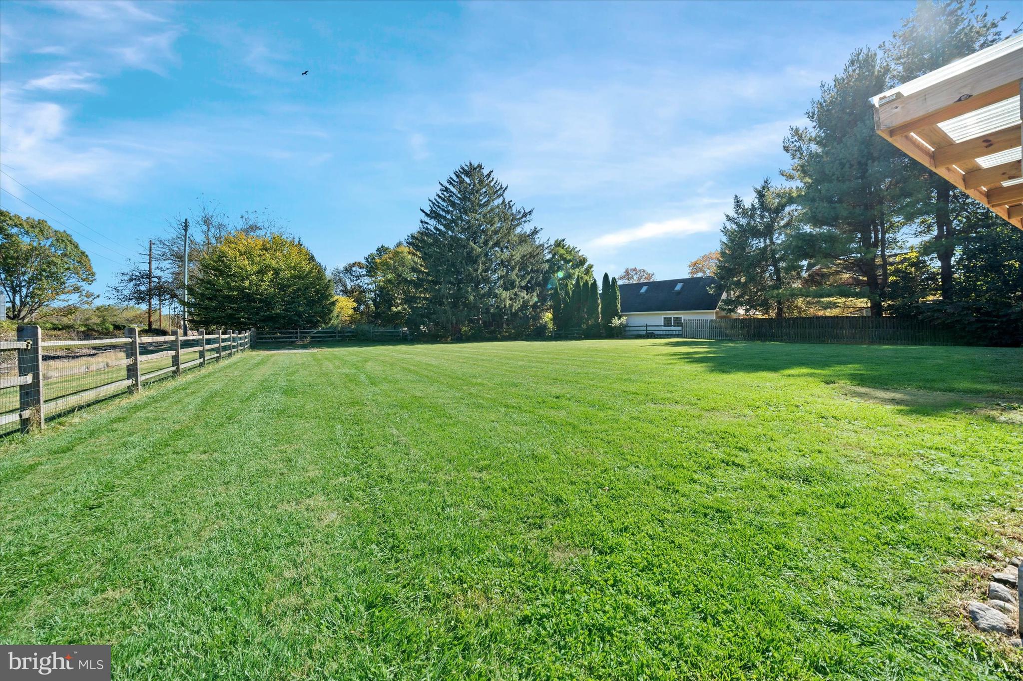 108 Evanson Road Hockessin, DE 19707 - Photo 40 of 49 a view of a field of grass and trees