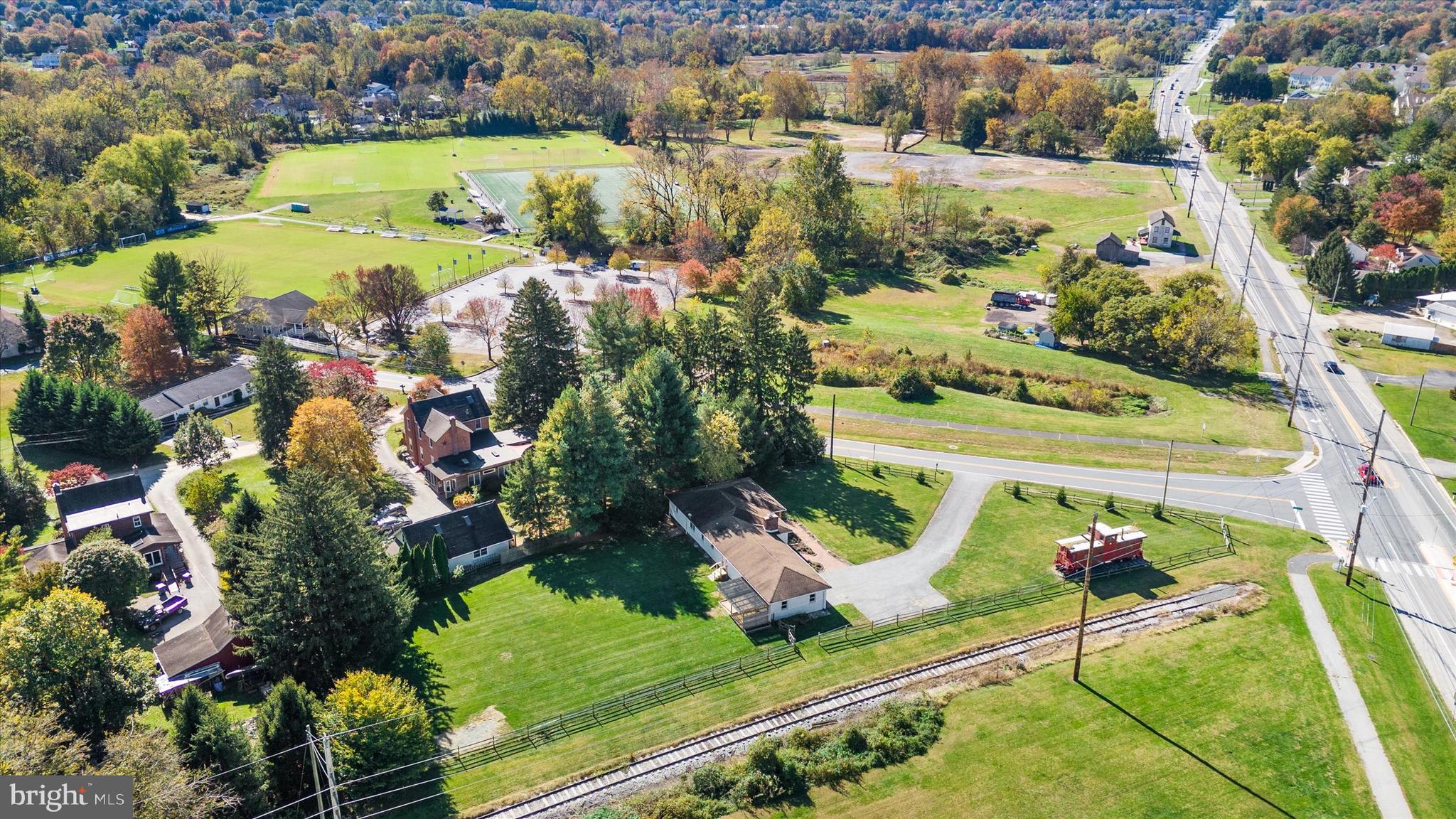108 Evanson Road Hockessin, DE 19707 - Photo 46 of 49 an aerial view of residential houses with outdoor space