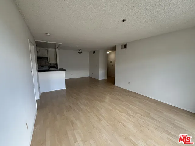 a view of a kitchen with a sink