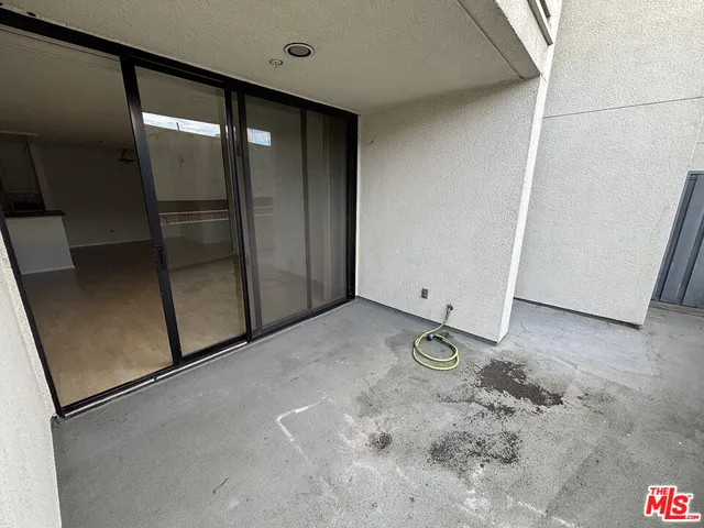 a view of a refrigerator in kitchen
