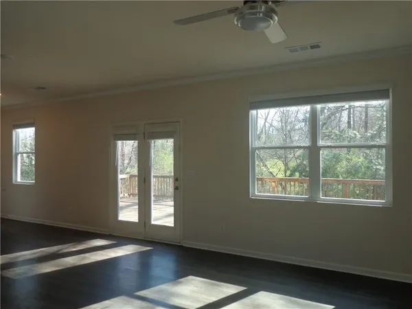 a view of an empty room and window