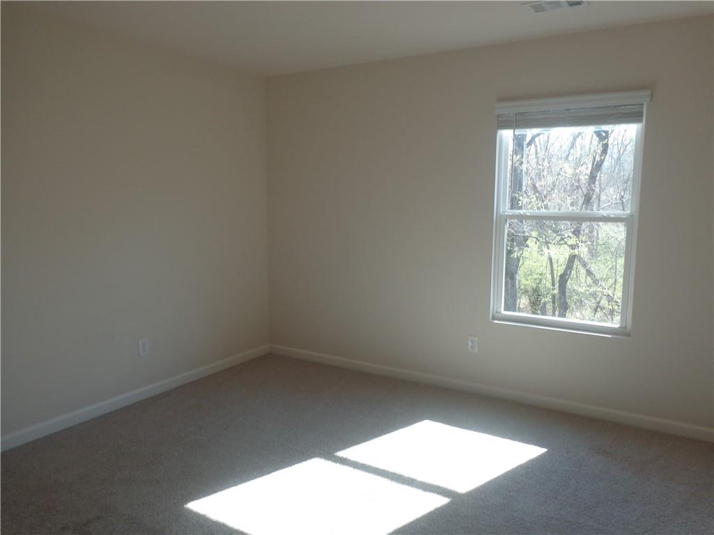 132 Russell Road Pendergrass, GA 30567 - Photo 32 of 50 an empty room with a window
