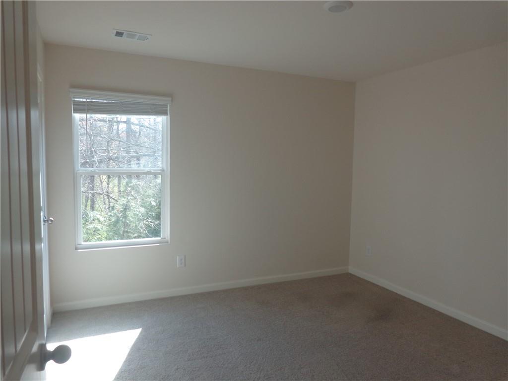 132 Russell Road Pendergrass, GA 30567 - Photo 34 of 50 an empty room with a window