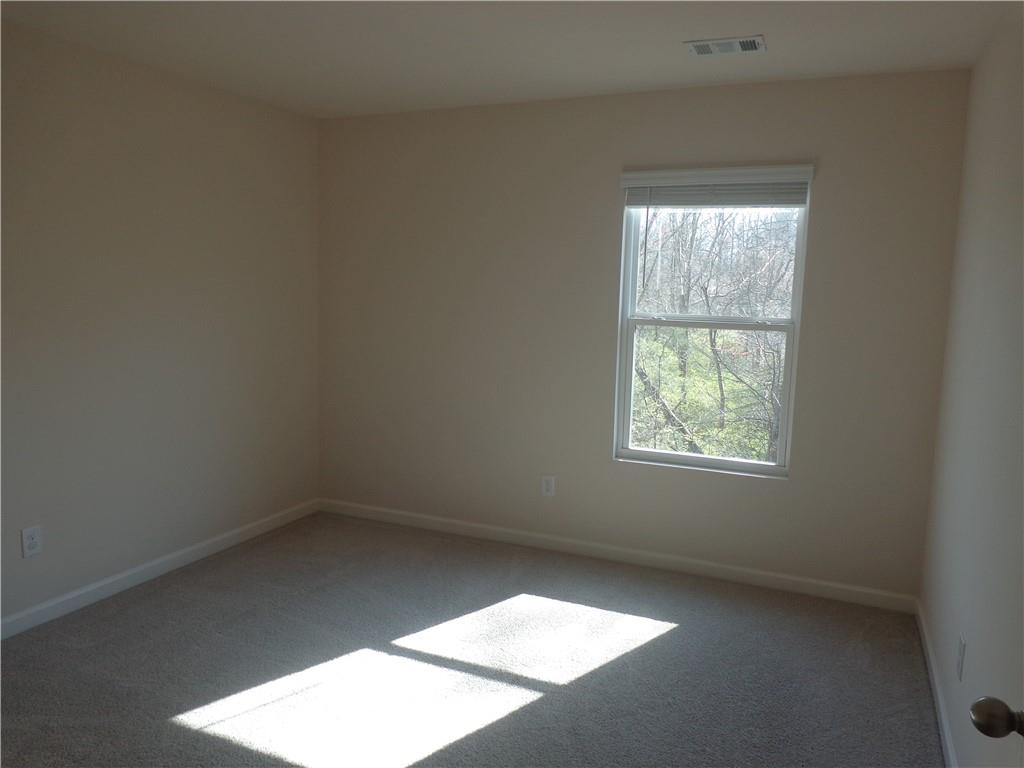 132 Russell Road Pendergrass, GA 30567 - Photo 35 of 50 an empty room with a window