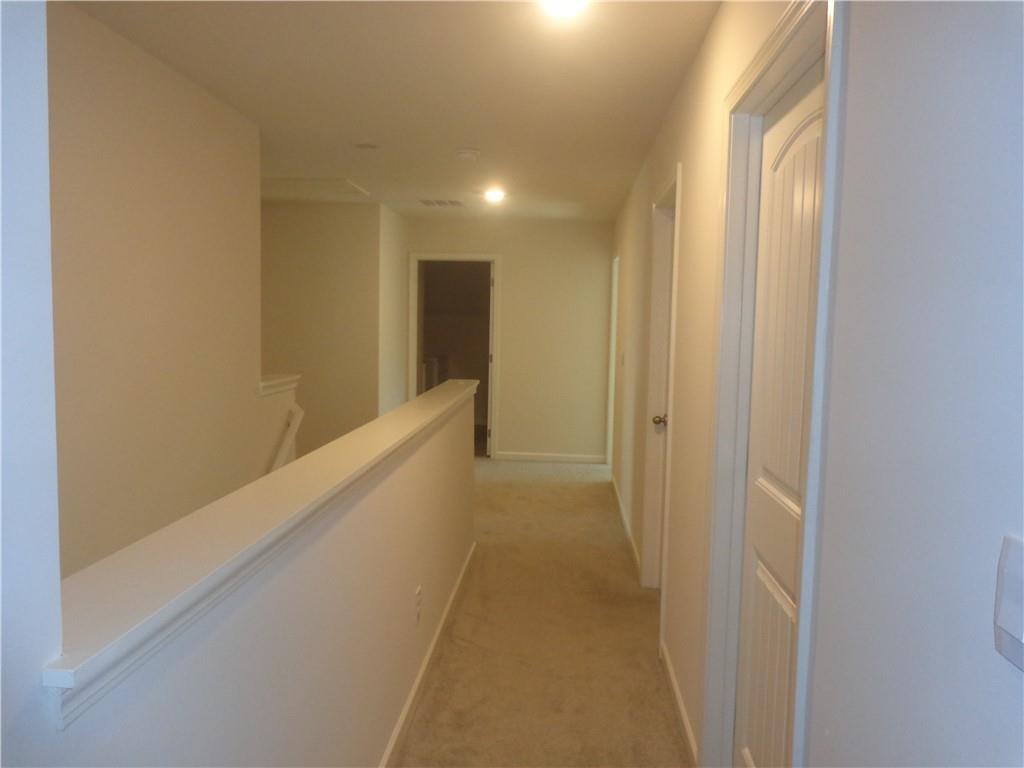 132 Russell Road Pendergrass, GA 30567 - Photo 37 of 50 a view of hallway with windows