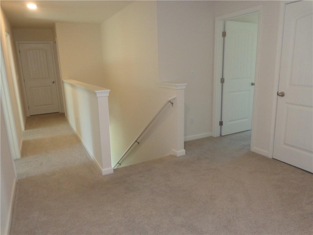 132 Russell Road Pendergrass, GA 30567 - Photo 38 of 50 a view of an empty room with a hallway