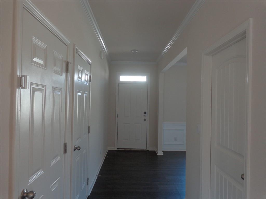 132 Russell Road Pendergrass, GA 30567 - Photo 6 of 50 a view of a hallway with wooden floor