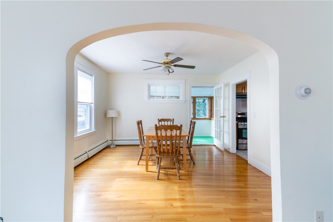 28 College Road Providence, RI 02908 - Photo 8 of 22 Formal dining room looking from living room. Sun room is bey9ond