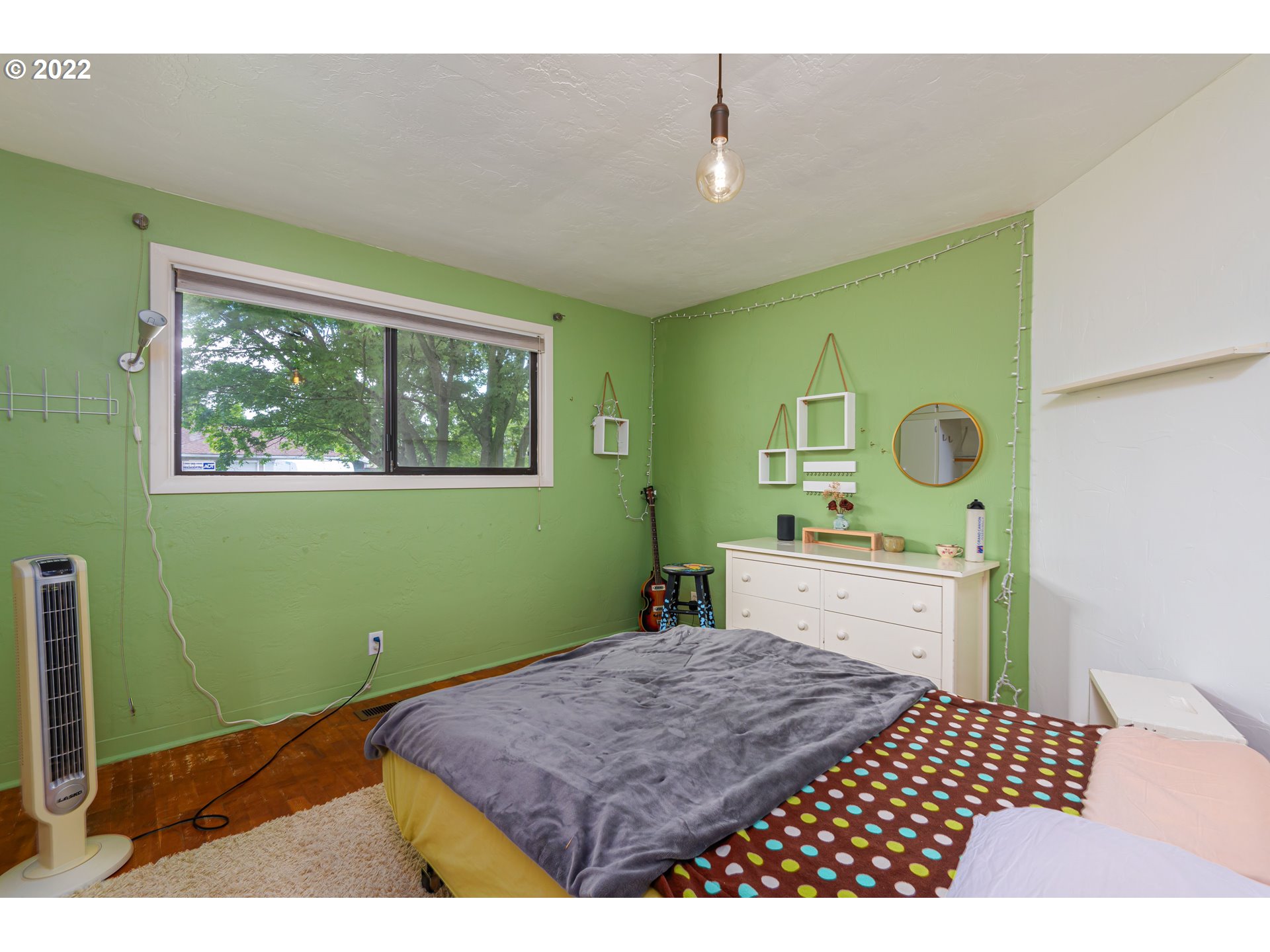 2390 Frontier Drive Eugene, OR 97401 - Photo 15 of 32 a bedroom with a bed and a dresser