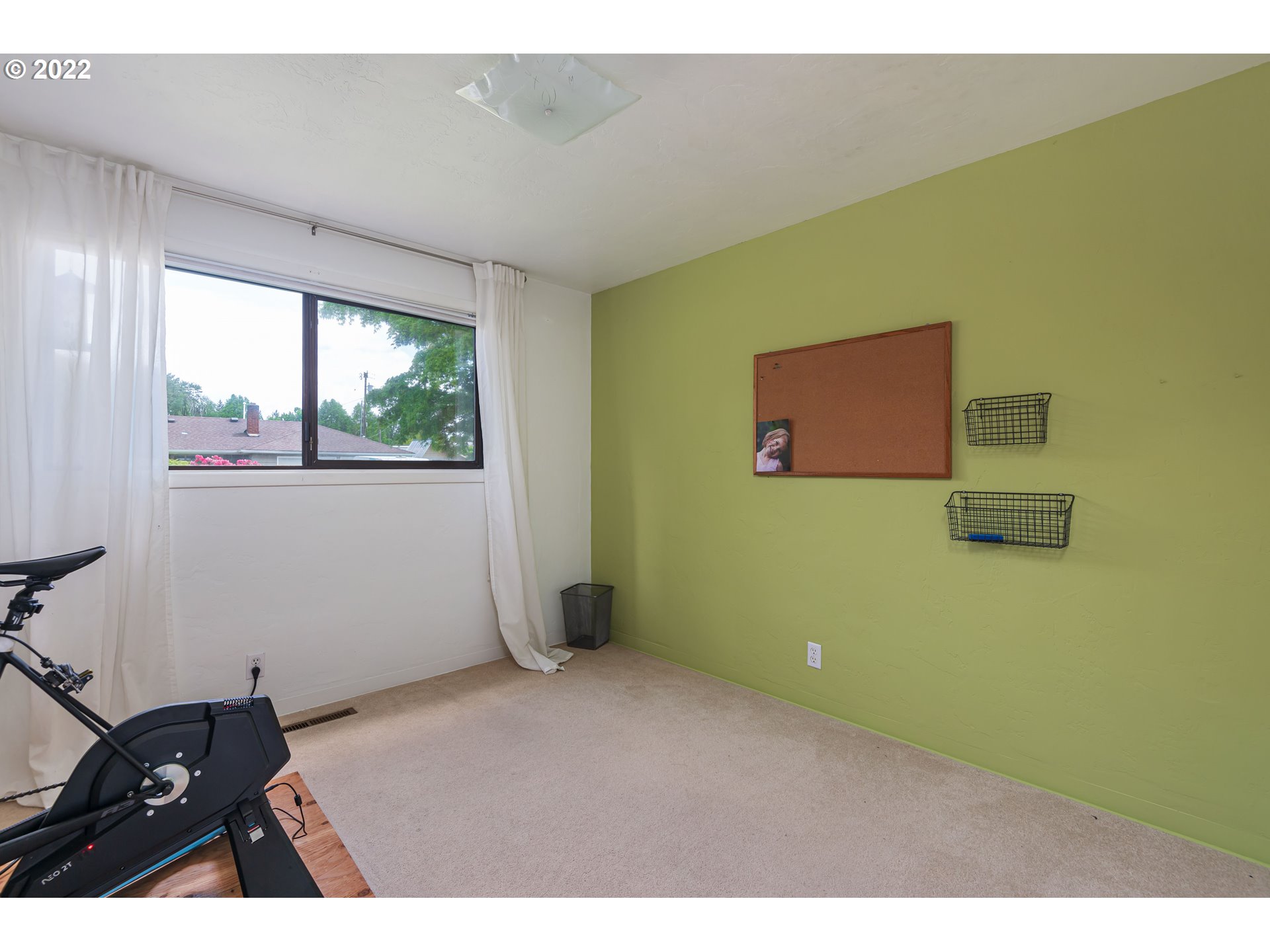2390 Frontier Drive Eugene, OR 97401 - Photo 16 of 32 a view of room with hardwood floor and window