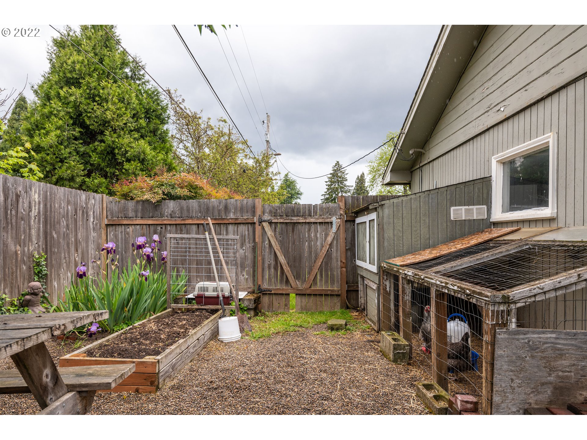 2390 Frontier Drive Eugene, OR 97401 - Photo 27 of 32 a view of a backyard with wooden fence