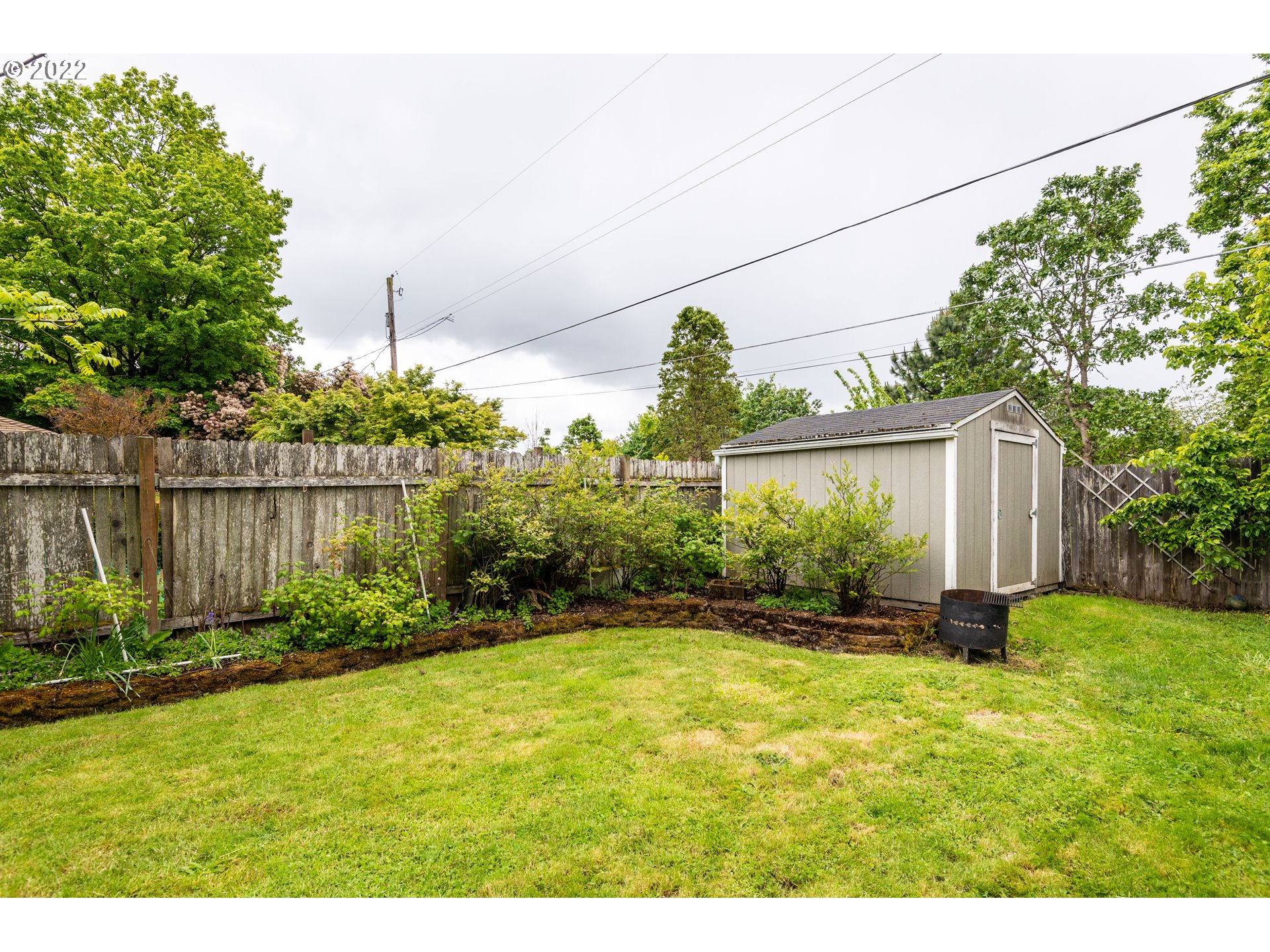 2390 Frontier Drive Eugene, OR 97401 - Photo 28 of 32 a garden with plants in front of it