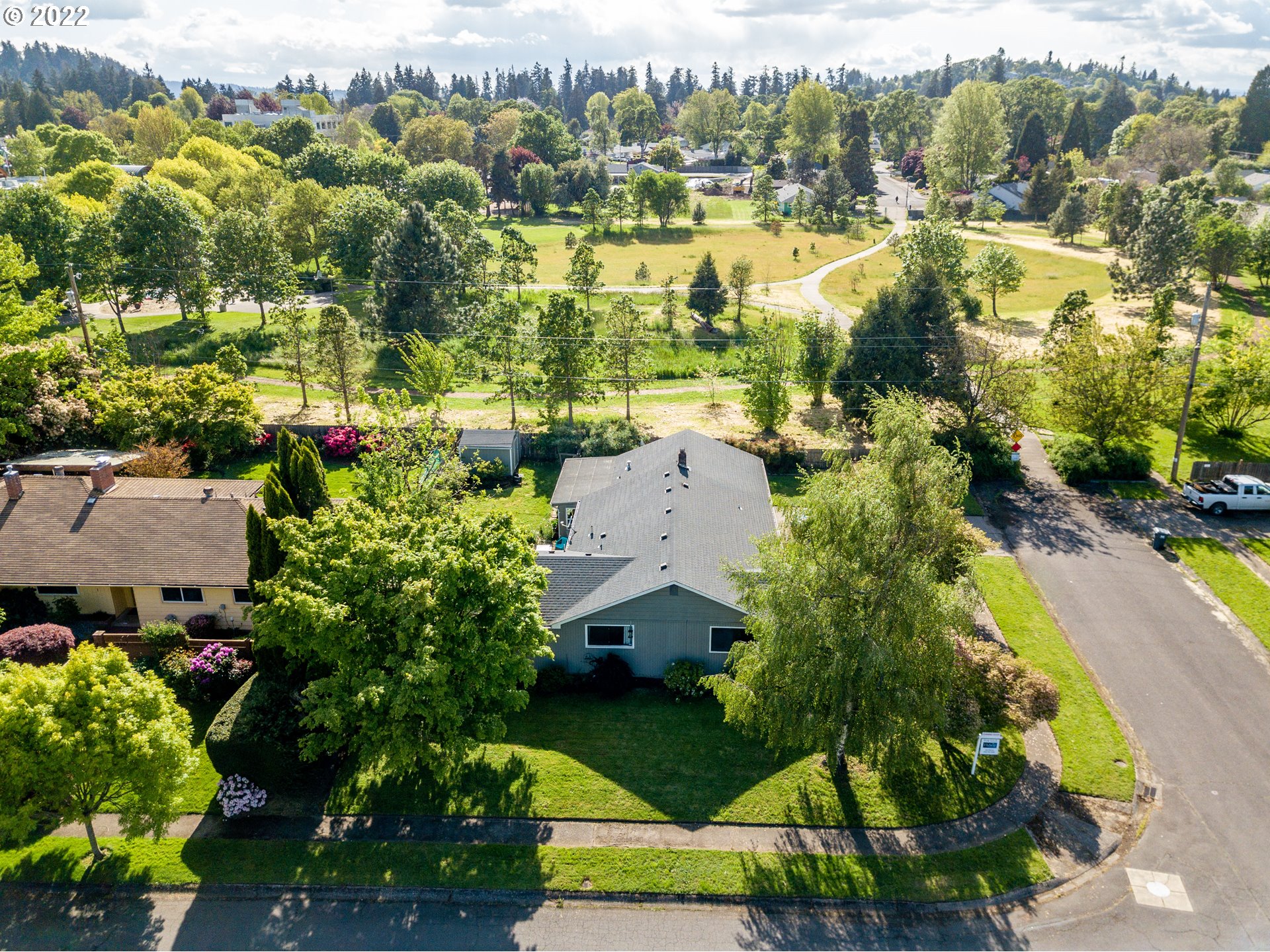 2390 Frontier Drive Eugene, OR 97401 - Photo 31 of 32 an aerial view of residential houses with outdoor space and trees all around