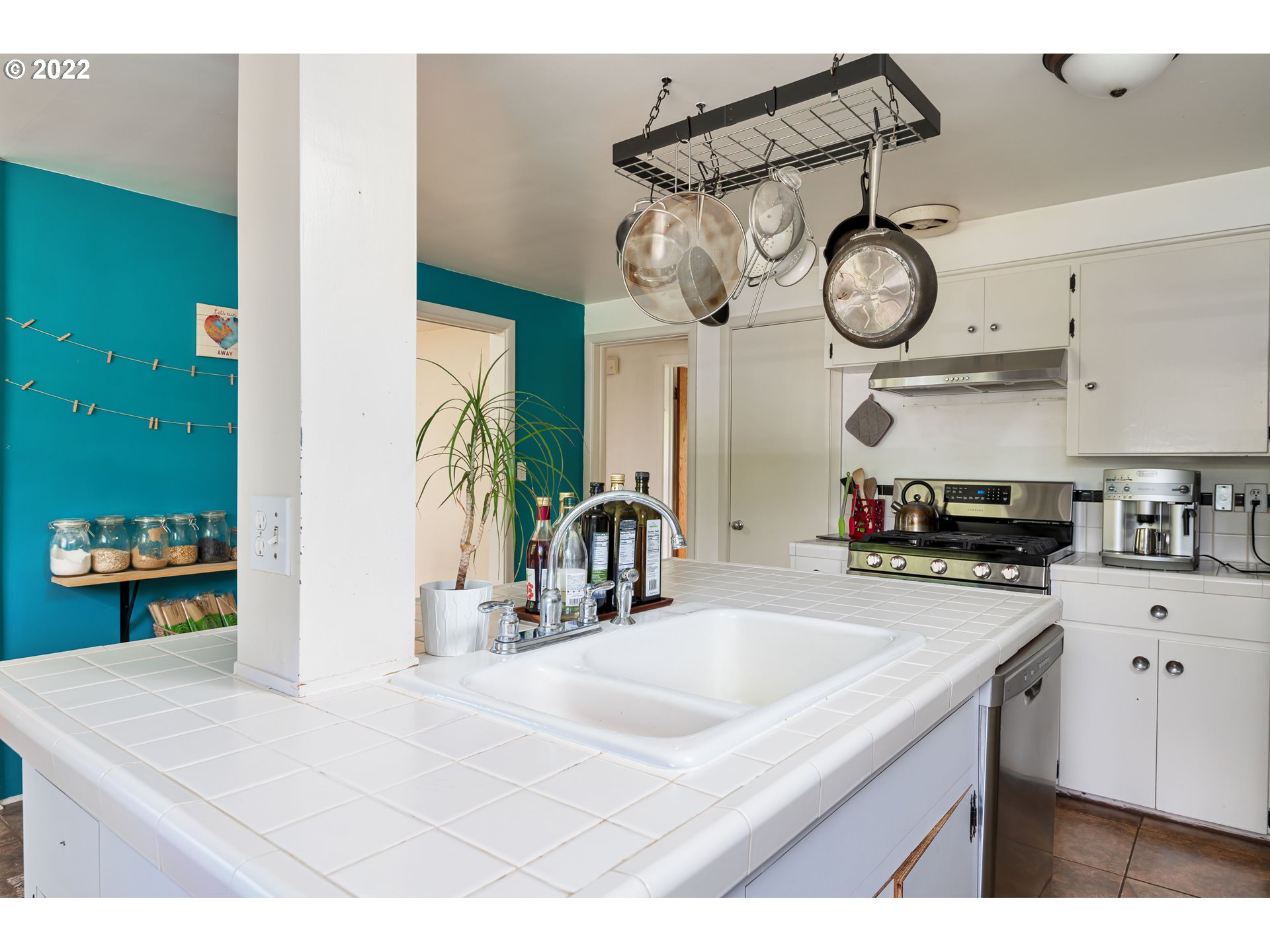 2390 Frontier Drive Eugene, OR 97401 - Photo 9 of 32 a kitchen with lots of counter top space and stainless steel appliances