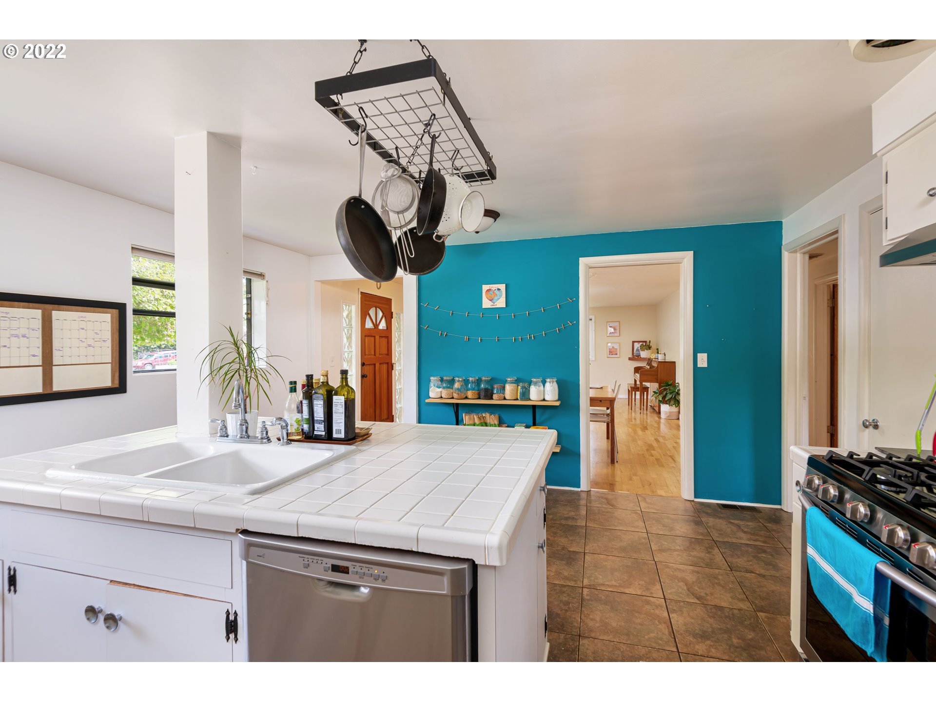 2390 Frontier Drive Eugene, OR 97401 - Photo 10 of 32 a kitchen with stainless steel appliances granite countertop a sink and stove