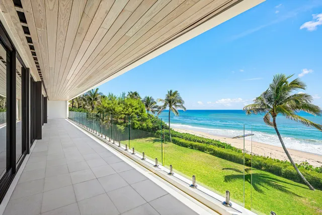 a view of swimming pool from a balcony