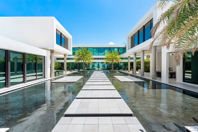 a view of a building with a swimming pool