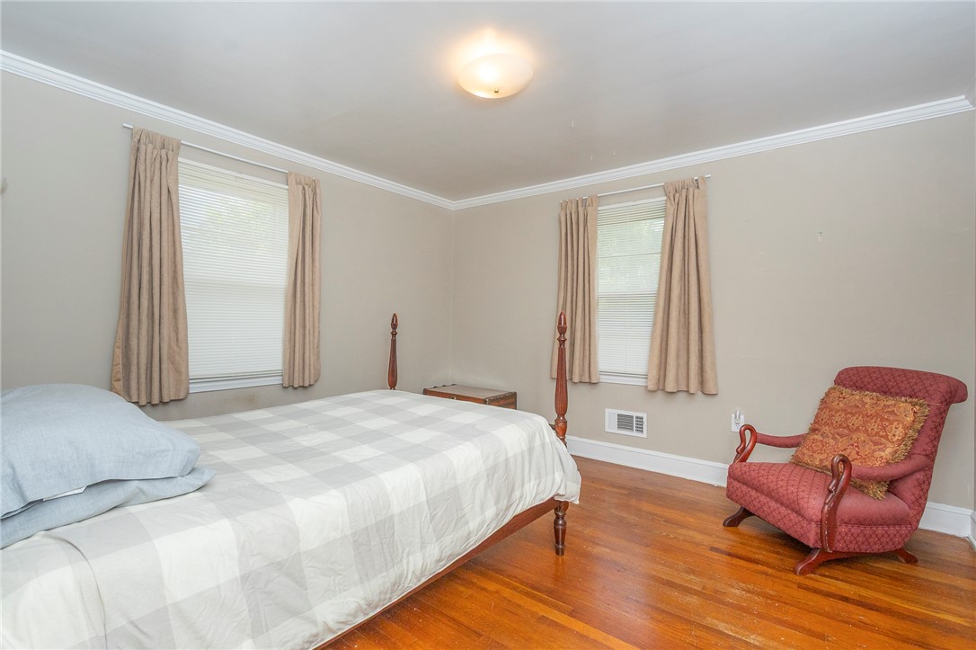 1218 Bolt Drive Anderson, SC 29621 - Photo 26 of 46 Hardwood floors and a calming neutral palette define this cozy and well-lit bedroom.