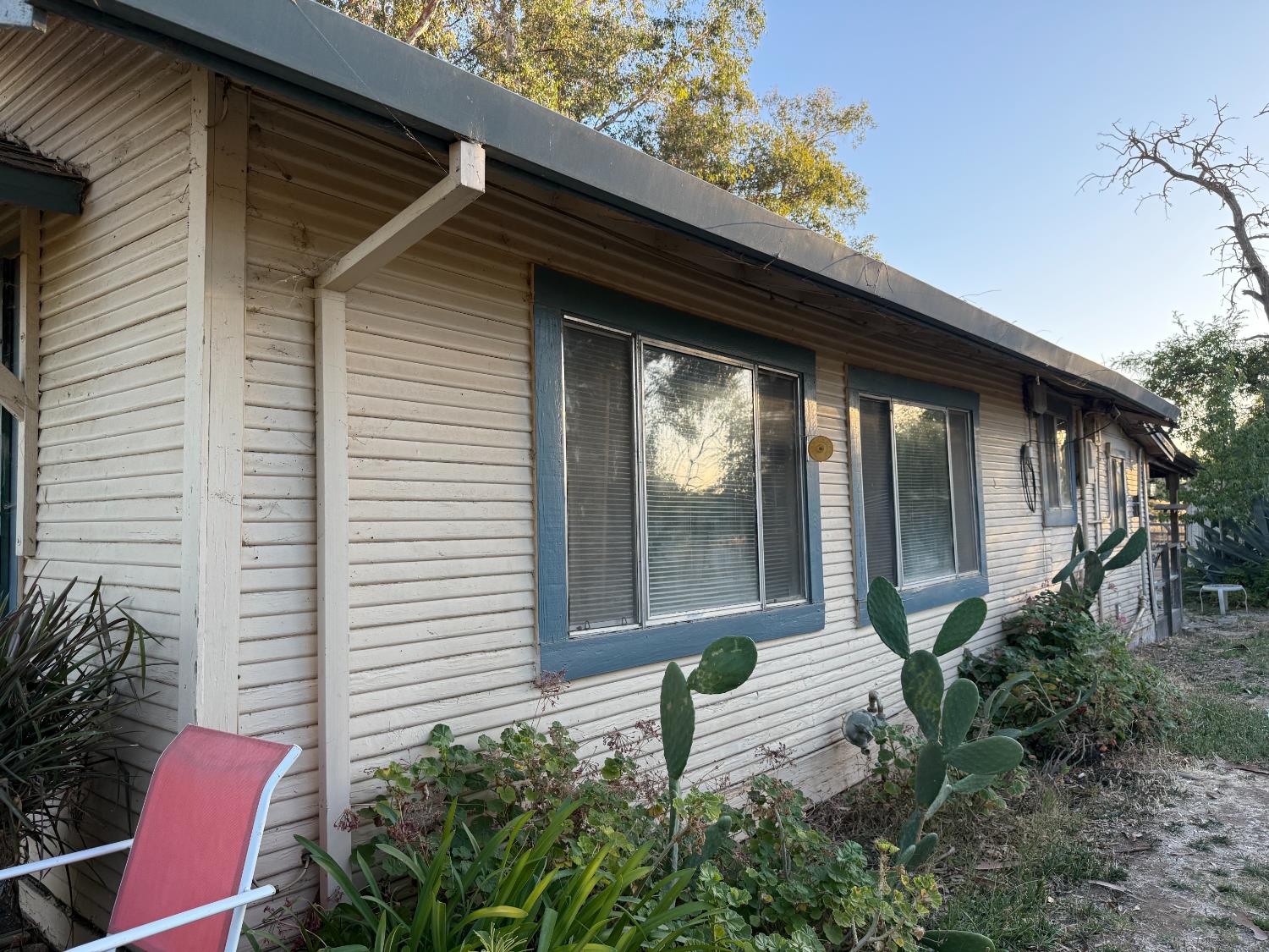 7133 West 2nd Street Rio Linda, CA 95673 - Photo 10 of 63 a front view of a house with a yard