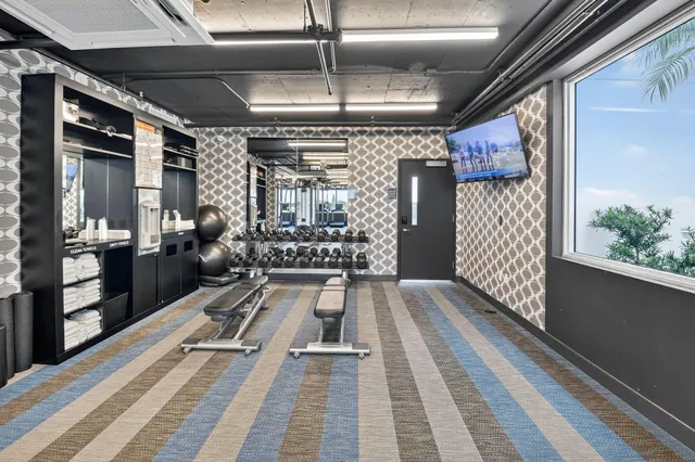 a view of a room with gym equipment