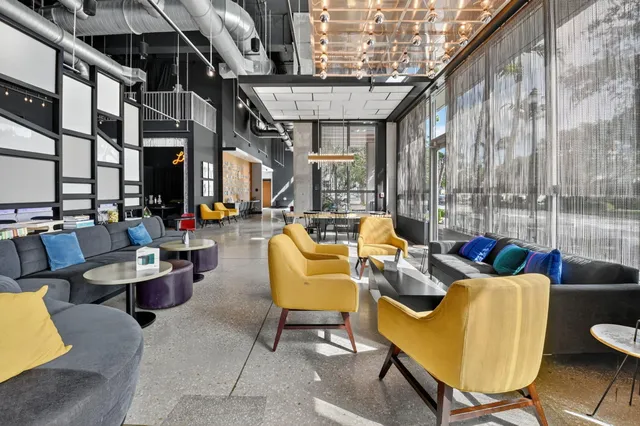 a view of an chairs and tables in the patio