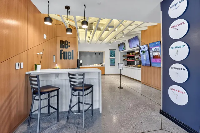 a view of a kitchen with furniture and a window