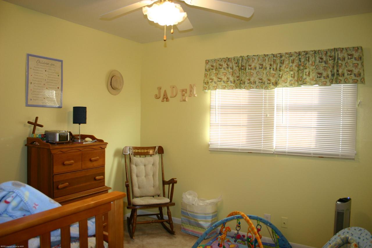 4618 South Rusk Street Amarillo, TX 79110 - Photo 9 of 10 a view of a workspace with furniture