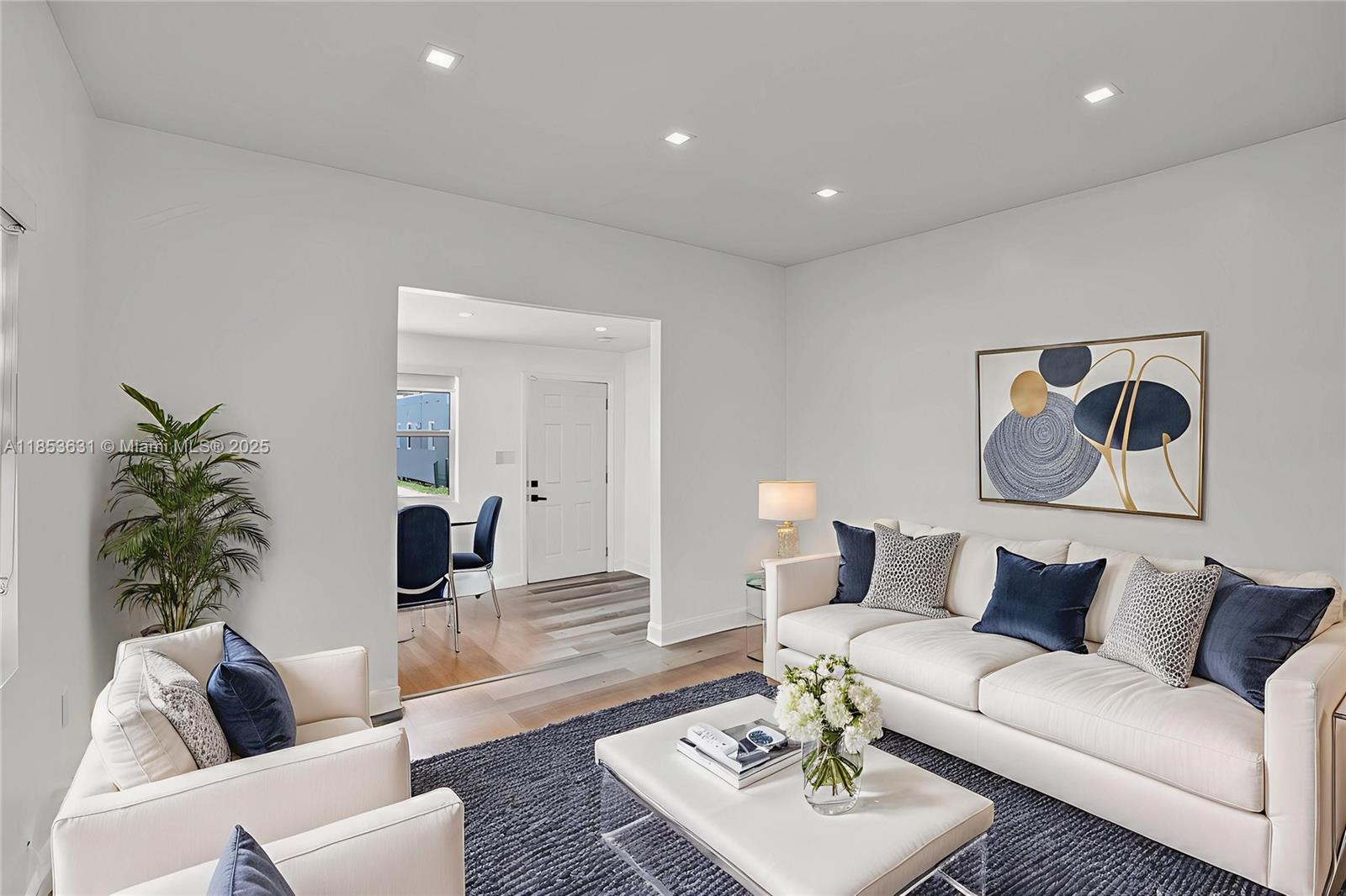 a living room with furniture and a couch