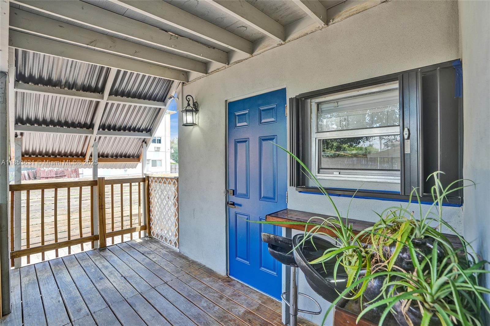 2135 Southwest 4th Street Miami, FL 33135 - Photo 19 of 28 a view of a livingroom with furniture and staircase