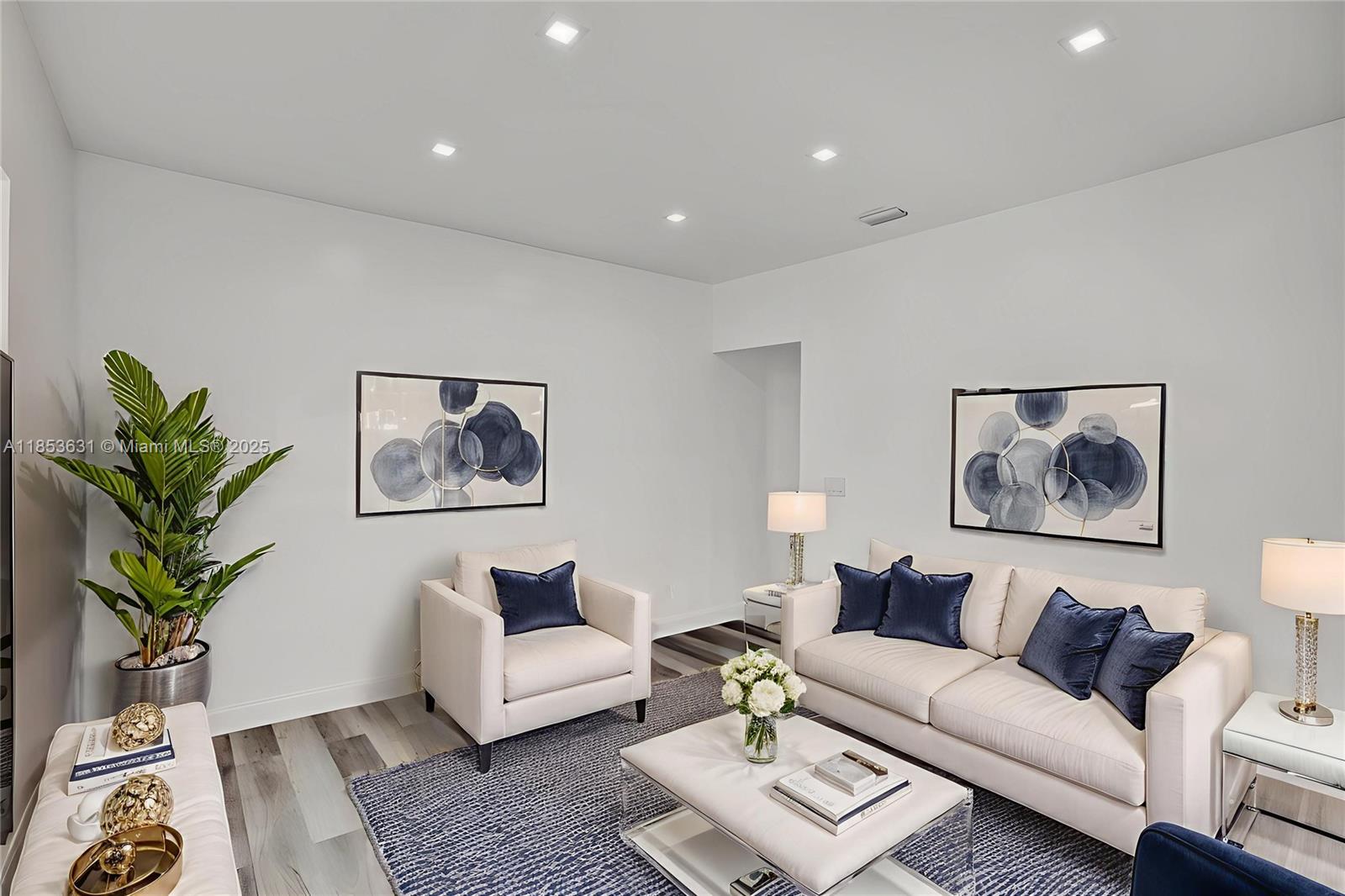 2135 Southwest 4th Street Miami, FL 33135 - Photo 8 of 28 a living room with furniture a couch and a potted plant