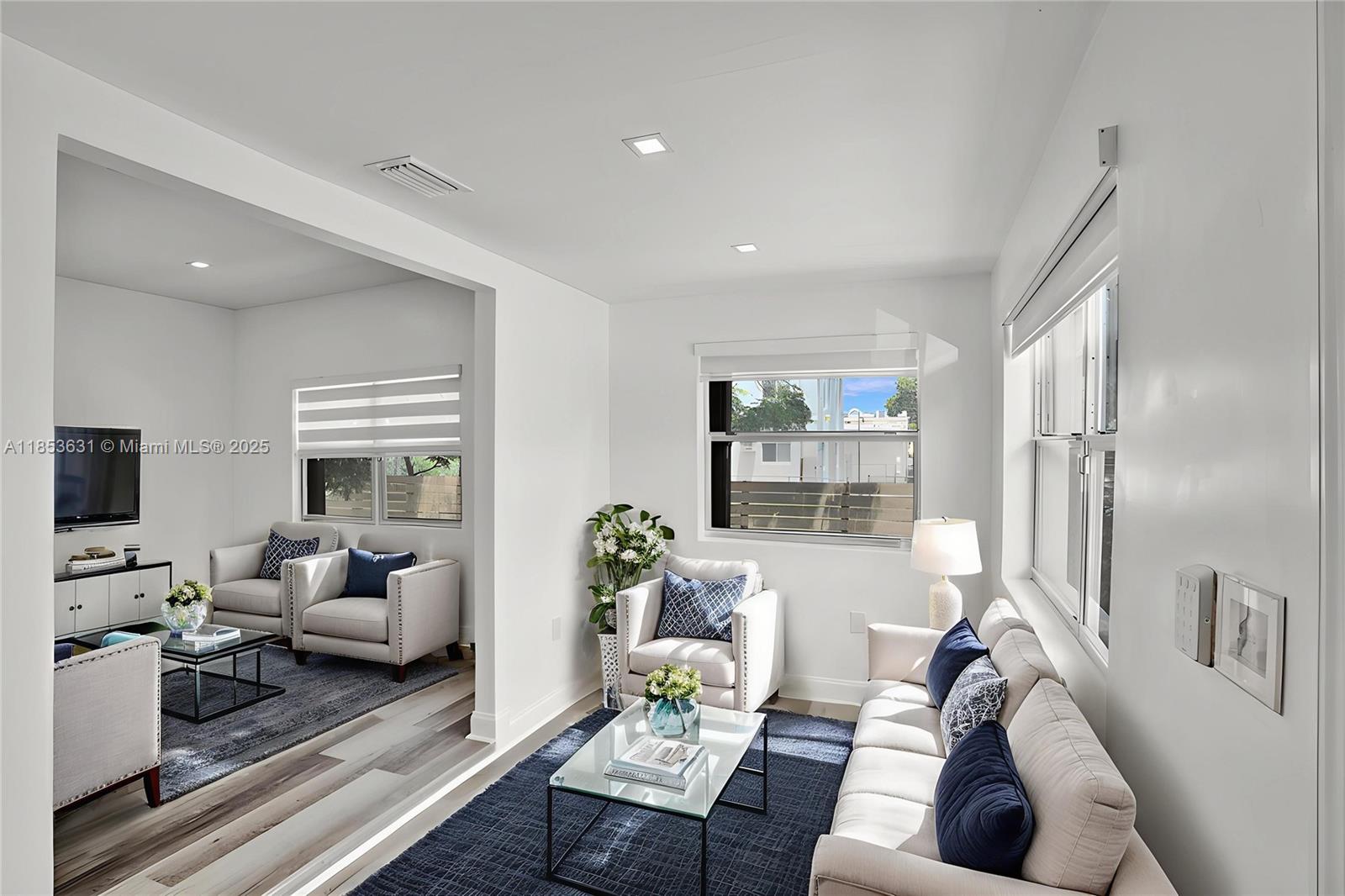 2135 Southwest 4th Street Miami, FL 33135 - Photo 9 of 28 a living room with furniture and a window