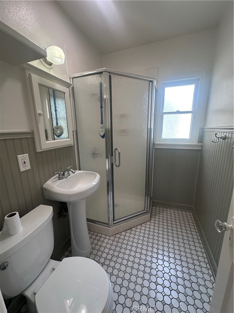 243 North Grand Street, Unit 1/2 Orange, CA 92866 - Photo 14 of 29 a bathroom with a sink toilet and shower