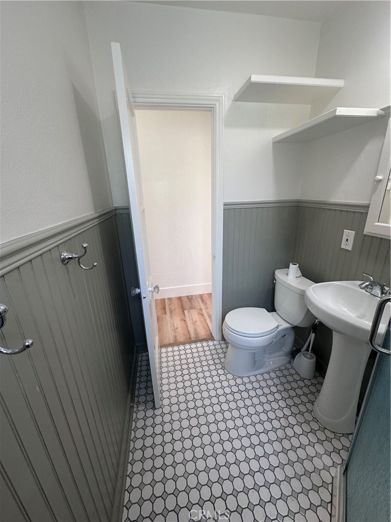 243 North Grand Street, Unit 1/2 Orange, CA 92866 - Photo 17 of 29 a bathroom with a toilet and a shower