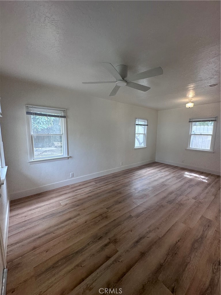 243 North Grand Street, Unit 1/2 Orange, CA 92866 - Photo 23 of 29 a view of an empty room with window and wooden floor