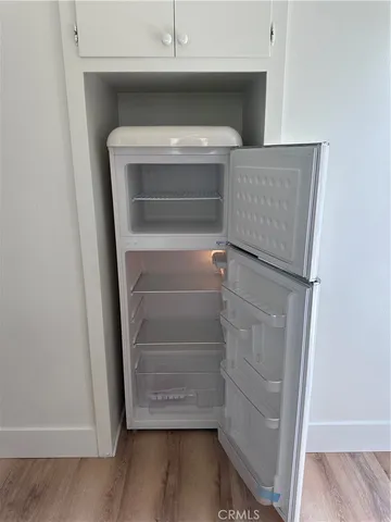 a view of a fountain in front of a house