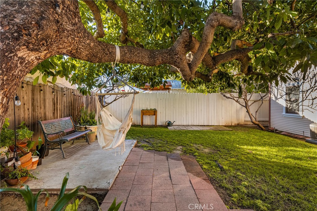243 North Grand Street, Unit 1/2 Orange, CA 92866 - Photo 29 of 29 a backyard of a house with table and chairs