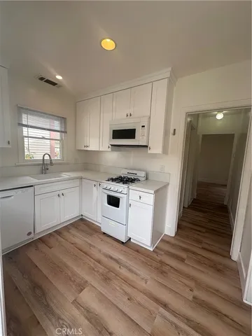 a view of a building with sitting area